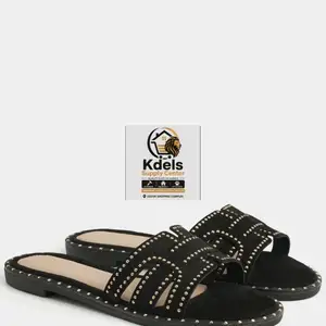 Studded Slide Sandals bring together comfort and versatility. Designed with a sl, Couva
