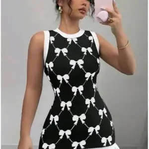 Selianne / Elenzga Sleeveless Bowknot Ruffle Hem Sweater Dress, Couva