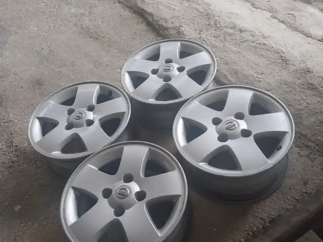 15 inch Original Nissan Rims, Cross Crossing