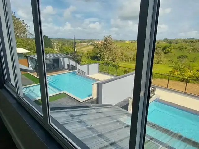 Modern Dual-Villa with Private Pools in Serene Central Trinidad, Freeport