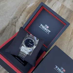 Tissot PRX 40mm T137.410.11.041.00 316L Stainless Blue Dial Men's Quartz Watch, St. Joseph