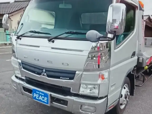canter tow truck on order, Piarco