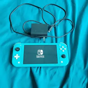 Turquoise Nintendo Switch Lite with USB Controller, Arima