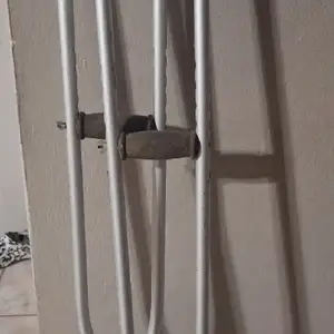 Pair of Crutches, Port of Spain