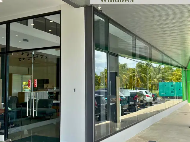Installation of Storefront windows, auto doors, ACP tiles, patch fitting doors &, Aranguez