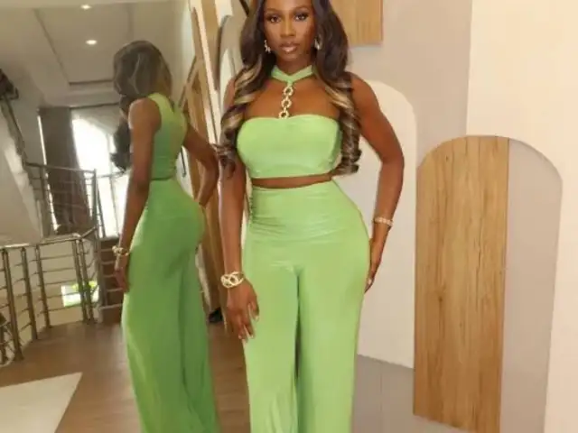 two-piece outfit featuring a halter crop top with a gold chain detail and high-w, Couva